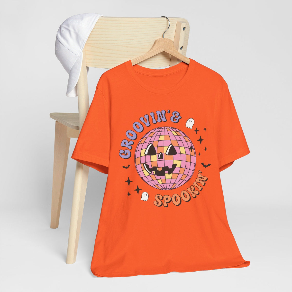 Groovin' & Spookin' - Retro Halloween Disco Ball Graphic T-Shirt