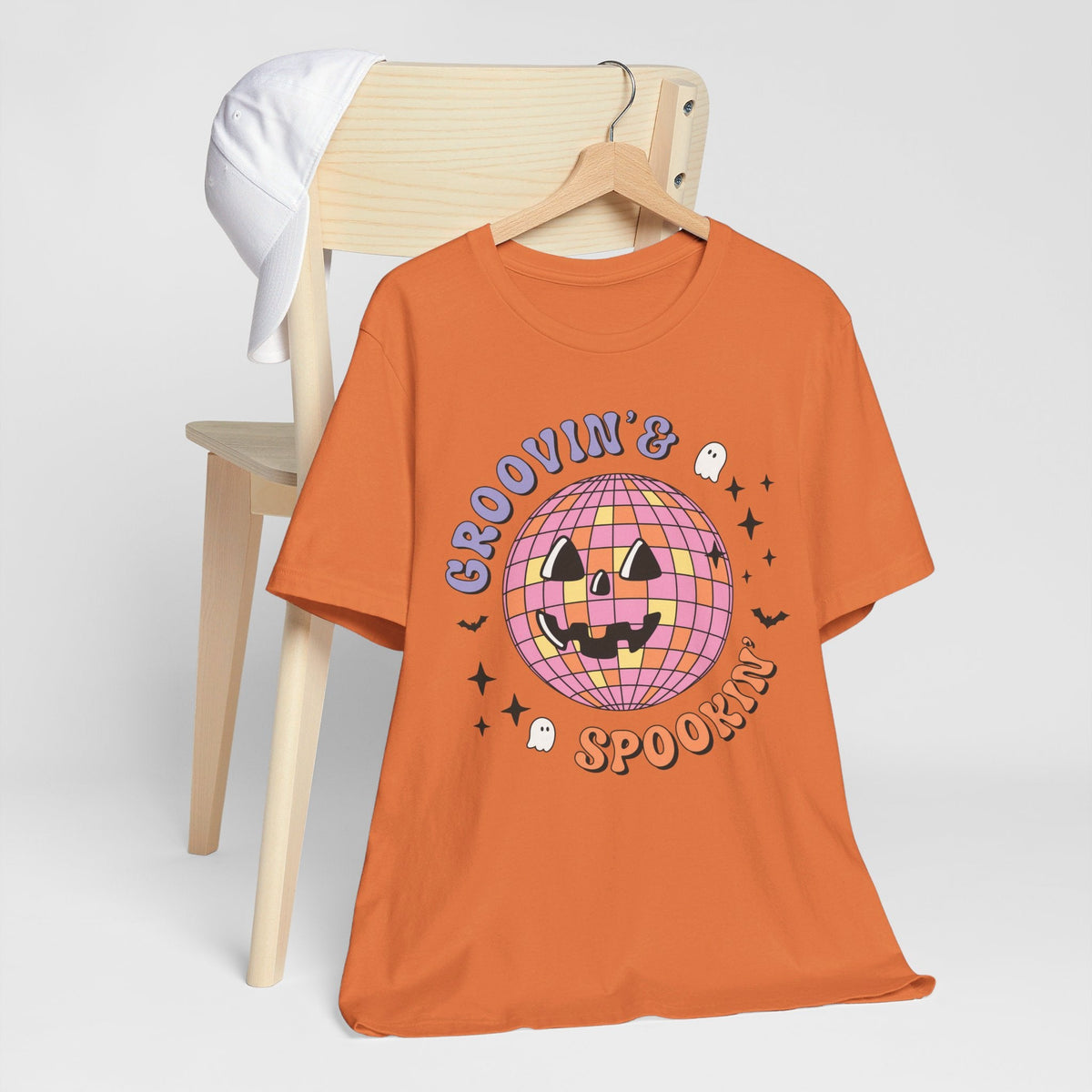 Groovin' & Spookin' - Retro Halloween Disco Ball Graphic T-Shirt