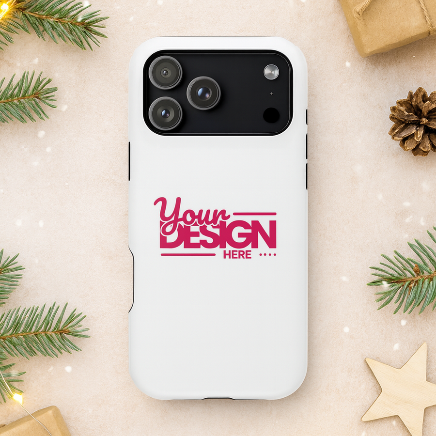 Phone case with 'Your Design Here' text on a festive background with Christmas decorations.