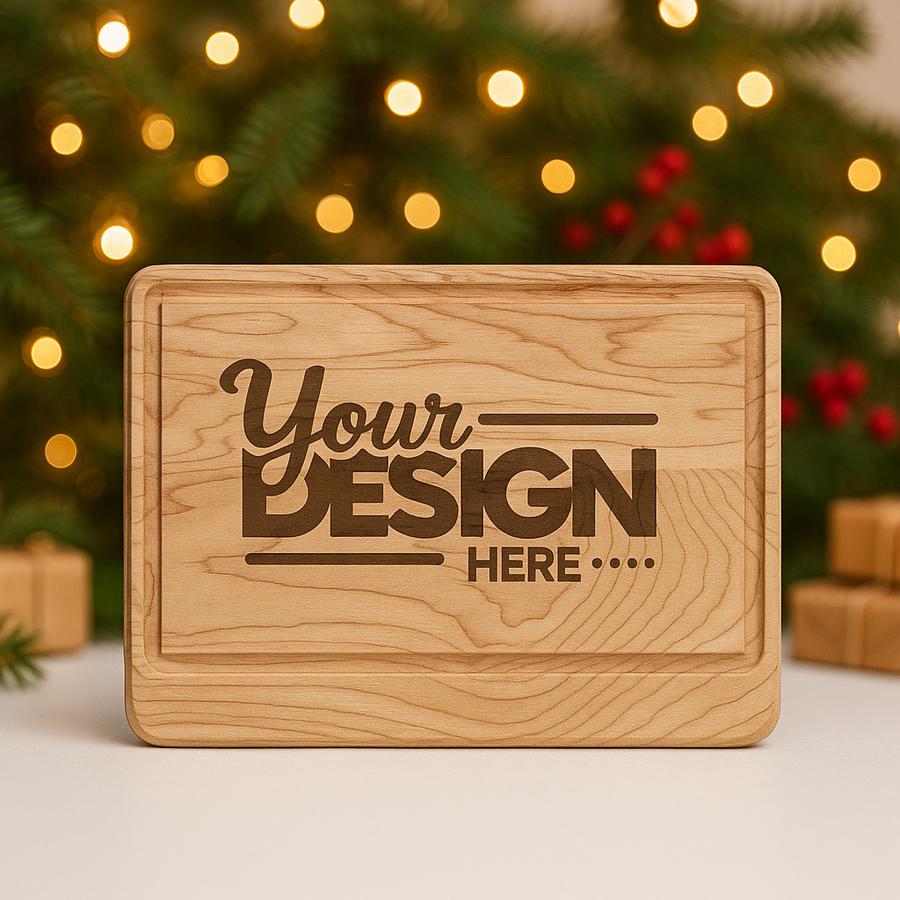 Wooden cutting board with 'Your Design Here' text in front of a Christmas tree.